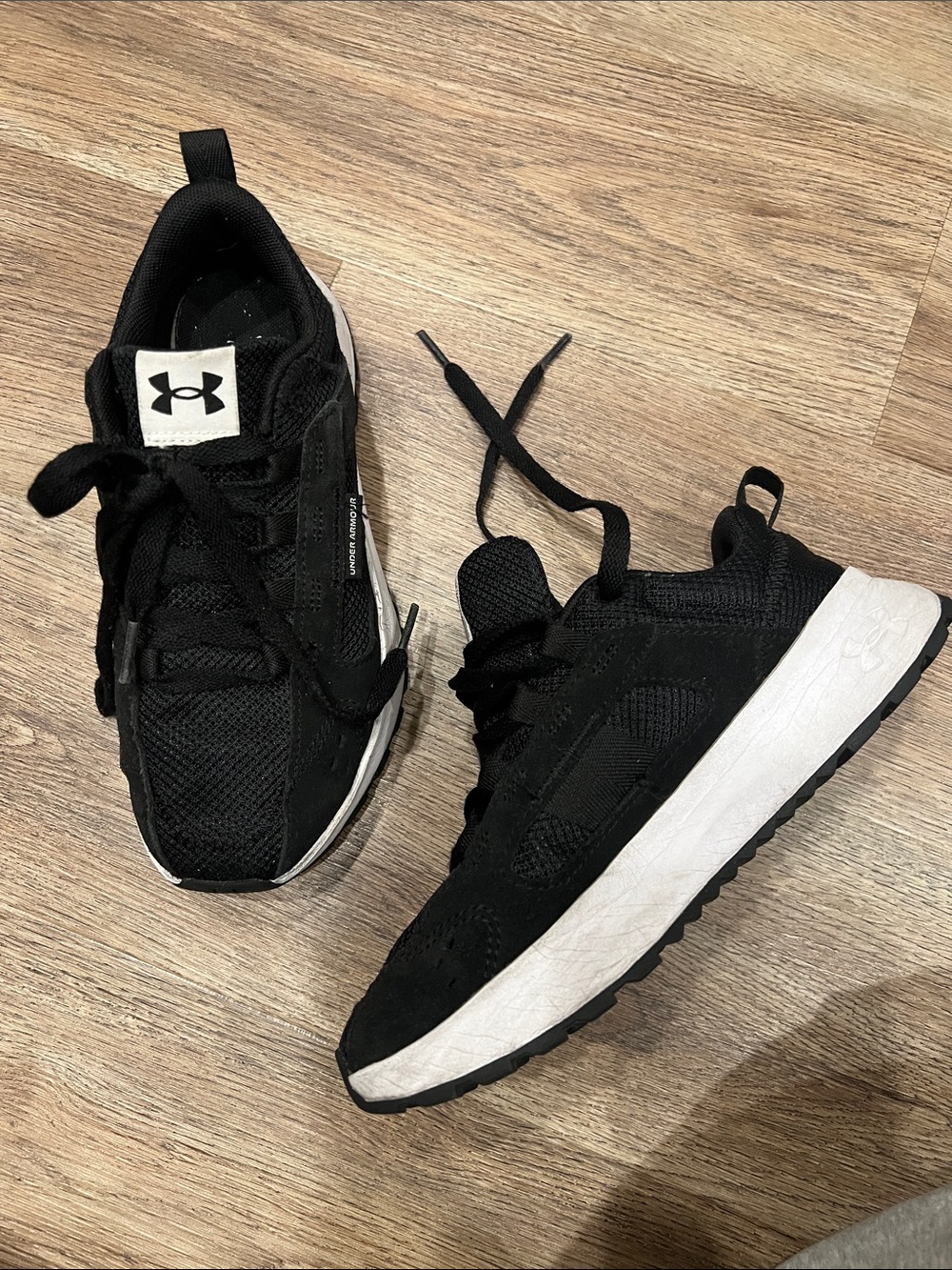 Under Armour Black and White kids Athletic Sneakers